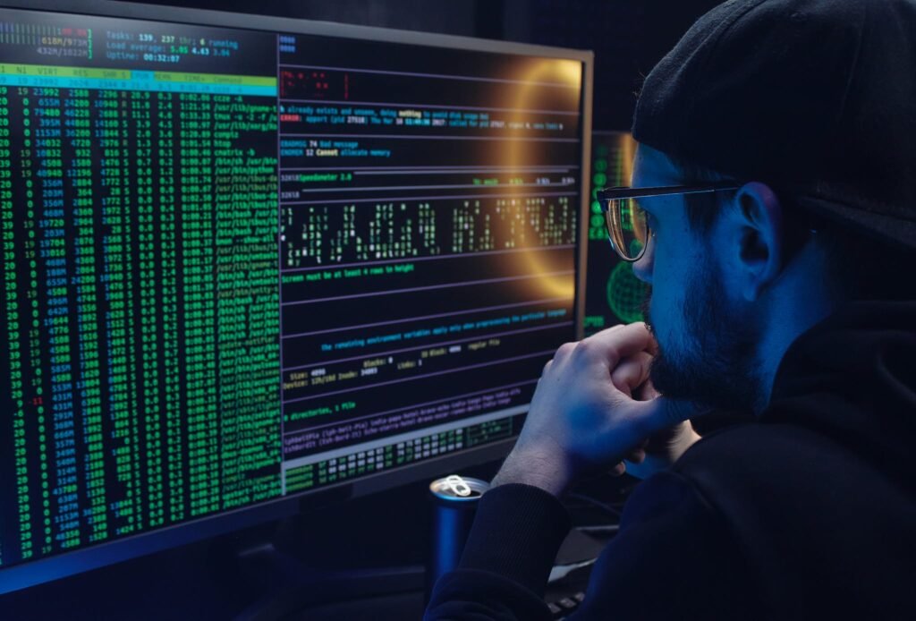 Man-analyzing-data-computer-screen-corporate-investigations-TTS
